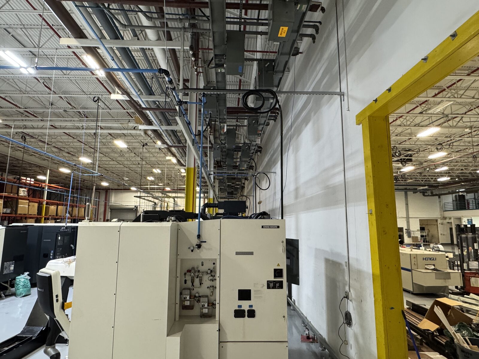 Point-of-use compressed air drop with filter regulator lubricator feeding a DMG MORI CNC machine